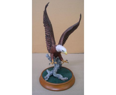 Franklin Mint, 1987 "American Majesty" eagle by Ronald Van Ruyckevelt,37 cm high (not including the stand),In fine condition,