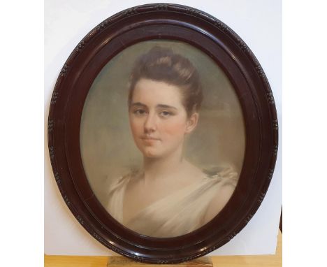 Late Victoria oval pastel portrait of young society lady in original frame, unsigned,The portrait measures 47 x 37 cm 