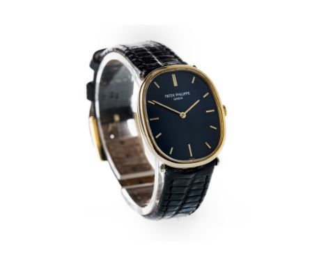 GENTLEMAN'S PATEK PHILIPPE GOLDEN ELLIPSE EIGHTEEN CARAT GOLD MANUAL WIND WRIST WATCH, the elliptical blue dial with applied 