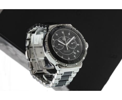 GENTLEMAN’S TAG HEUER FORMULA ONE DIAMOND SET STAINLESS STEEL WRIST WATCH, the round black dial with diamond dot hour markers