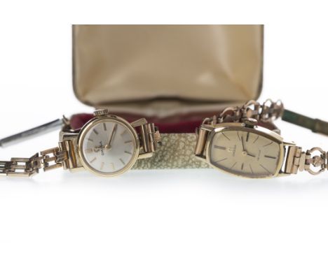 TWO LADY'S GOLD PLATED OMEGA MANUAL WIND WRIST WATCHES, comprising one with a round cream dial, applied gold coloured baton h