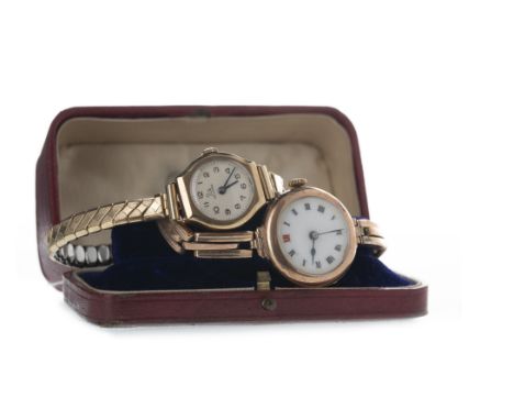 LADY'S GOLD MANUAL WIND WRIST WATCH, the round white dial with black Roman hour markers, the 12 marker in red, dot outer seco