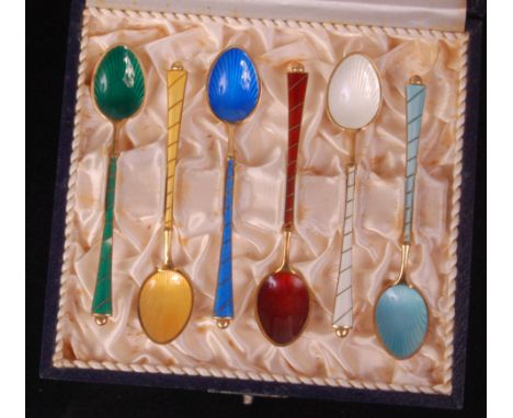 A cased set of six Art Deco silver gilt and guilloche enamel teaspoons,  enamelled in different colours and stamped 'Denmark 