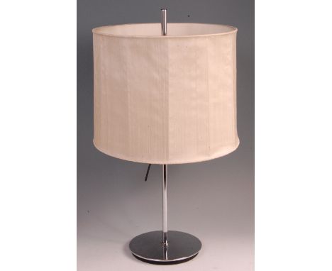 A 1980s German chrome table lamp, having a cream and black plastic two light fitting with rise-and-fall action, with integral