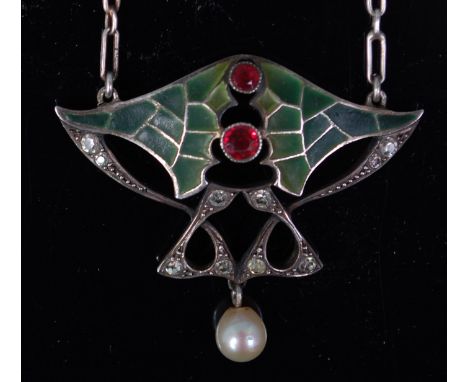 A French Art Nouveau plique-a-jour silver and enamel pendant, with stylised interlaced decoration set with diamond points and