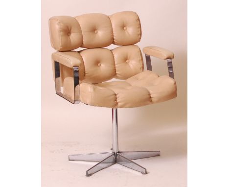 A 1960s flat-sided chrome and cream leather button back and seat upholstered swivel open desk chair, raised on five spoke bas