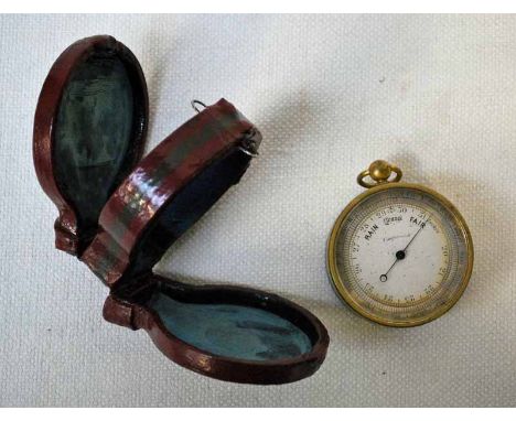An early 20th century pocket Barometer with Thermometer and Compass on the reverse, silvered barometer dial and ivory thermom