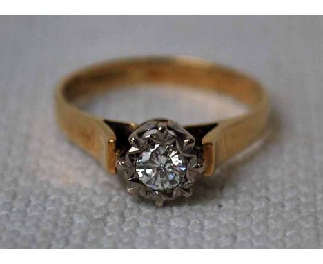 An 18ct yellow gold Diamond Solitaire Ring, the circular brilliant approx 0.2ct in an eight claw illusion setting, ring size 