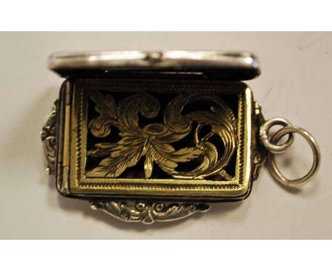 A small continental silver Vinaigrette of hinged rectangular form, engine turned hinged pierced gilt grille, early 19th centu