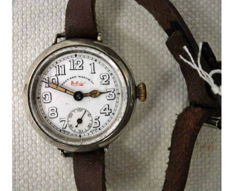 An early 20th century West End Watch Co Sillidar white metal cased military Wrist Watch, white dial, Arabic numerals, seconds