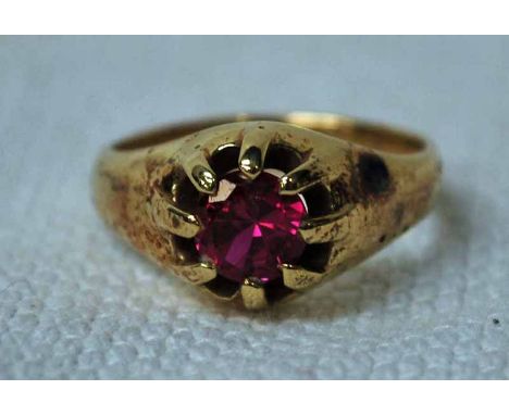 An 18ct marked yellow gold and Ruby Solitaire Ring, the circular ruby in an eight claw setting, ring size M, 5.1g  