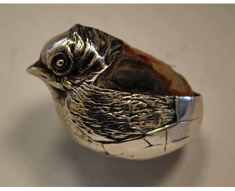 An Edwardian silver novelty Pin Cushion in the form of a Chick, Chester 1908 Registration number 476678, 42mm long 