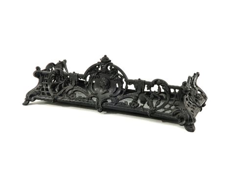 Cast iron, with portrait medallion, 59 x 10 x 26 cm.