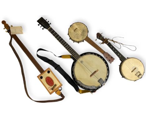 Four banjos include a Slowpaw Cigar Box guitar, an Ozark banjo, and a John Gret banjo.