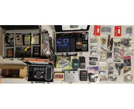 A collection of guitar pedals to include a Beringer X V-AMP, a Beringer UT100 Ultra Tremelo, a Beringer SM200 Slow Motion, a 