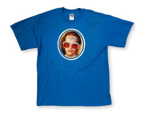 A t-shirt with portrait of Elton John produced in very lmited numbers to be worn by house band 'Four Poofs and a Piano' on th