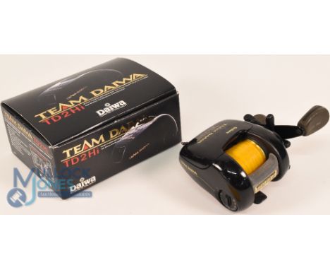Daiwa Team TD2m Hi Super Hi-Speed baitcasting reel, side tensioner, twin handles, 5 ball bearings, light use. In original box