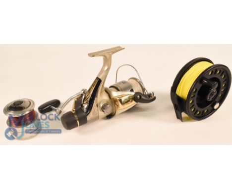 Shimano Exage 4000 RA fixed spool reel with spare spool, good bail, rear tensioner, runs well, in Essential zip case.  Intrep