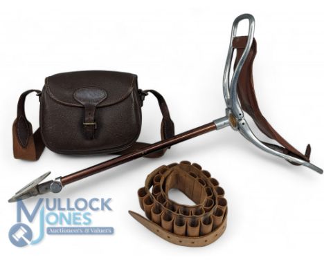 A Fine Featherweight Shooting stick, wide seat, extendable with leather seat, plus a leather shotgun cartridge belt for 26 ca