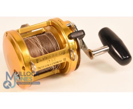 Penn International 11, 12LT, gold finish big game reel, made in USA, lever drag with preset, on/off ratchet check button, rod