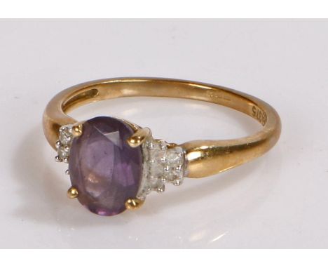 9 Carat gold ring set with a amethyst stone size K, gross weight 1.6g 