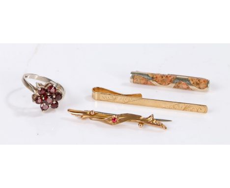 9 Carat Gold tie pin, gross weight 2.2g together with a 9 carat gold pin brooch set with a garnet, gross weight 1.6g, and a s