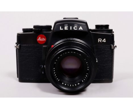 SLR-Kamera, Ernst Leitz, 1981/82 Leica R4 mit Summicron R 2/50mm, Serien-Nr. "1574037", geringe Altersspuren, Gebrauchsspuren