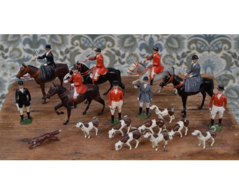 W Britain (Britains) group of lead figures from 'The Meet', comprising eight hounds in various poses, a Fox, two Huntsmen, a 