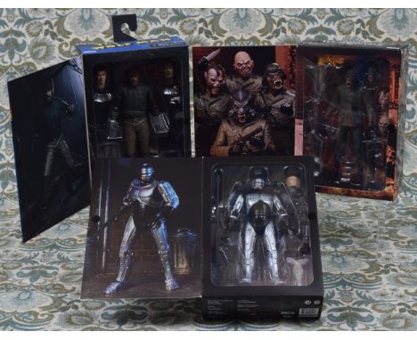A collection of Reel Toys 7" action figures, comprising 93N072021 The Wolf Man, boxed; 966N110620 An American Werewolf in Lon
