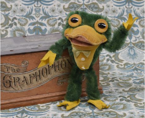 A 1930's novelty green mohair 'Flip the Frog' soft toy, probably manufactured by Dean's or Chiltern Toys, black painted woode