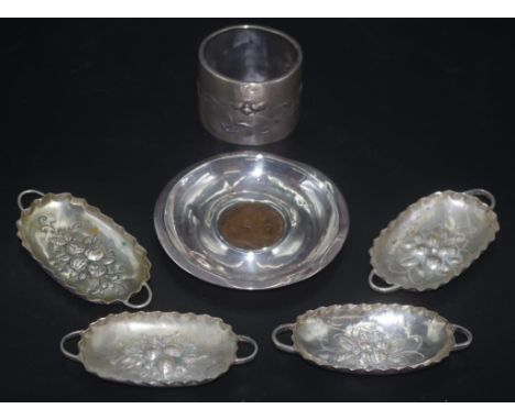 Five silver dishes and a serviette ring comprising of 4 small twin handle dishes stamped 800 (8cm wide), a Birmingham hallmar