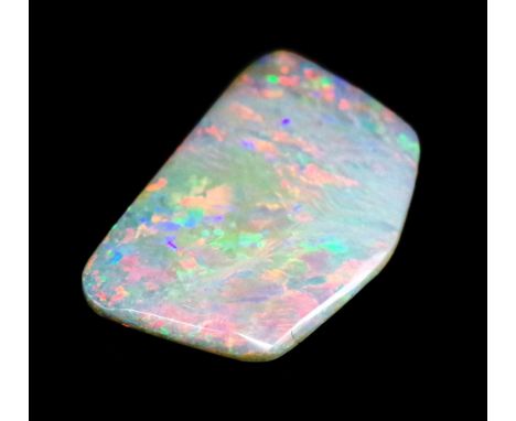 Loose white solid opal polygon form. Showing full spectrum of colours. Approx size 20.3mm longest edge, 13.mm widest point, 2