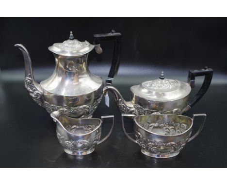 Four piece Sheffield silver plate tea &amp; coffee set including teapot, coffee pot, sugar bowl, and cream jug, embossed deco