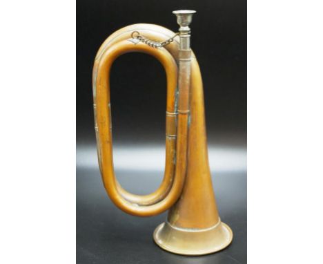 Vintage Military Bugle with a silver plated mouth piece.