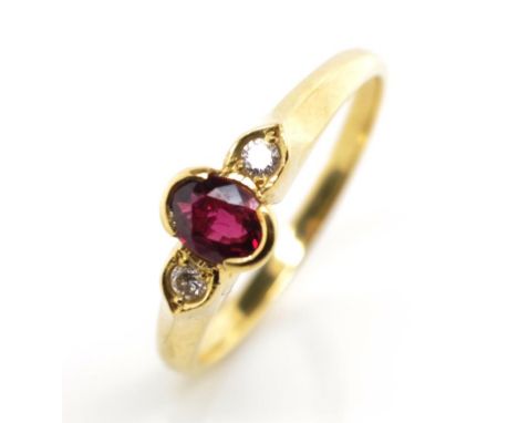 Garnet and diamond set 18ct yellow gold ring marked 750 approx ring size P, weight 2.7 grams