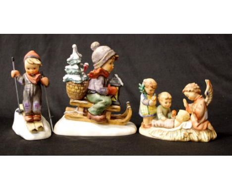 Three various Goebel Hummel figurines including Ride into Christmas, 14.5cm high (tallest) approx.