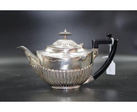 George V sterling silver teapot Sheffield 1934, makers Roberts and Belk, reeded decoration, (weight 272 grams approx).