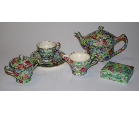 James Kent 'Hydrangea' six piece tea set including teapot, trio, covered sugar bowl, and milk jug; together with a James Kent