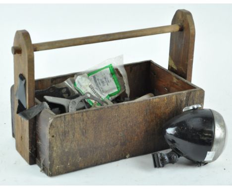 A tool carrier, 35.5cm wide, a bicycle lamp and tools