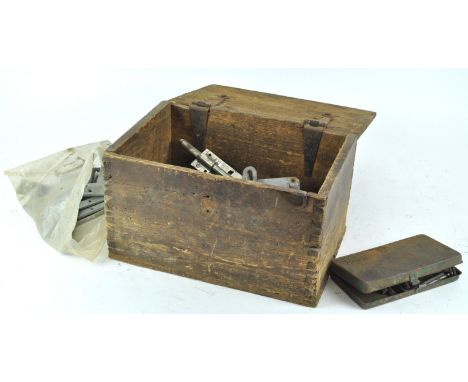 A wooden box, 35.5cm wide containing bolts and tools