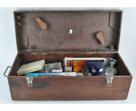 A wooden tool box with tools