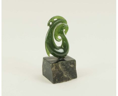 NEW ZEALAND GREENSTONE/JADE SCULPTURE, by Neil Hanna, in the form of a Maori ceremonial fishing hook, on stone base, 9cm H ov