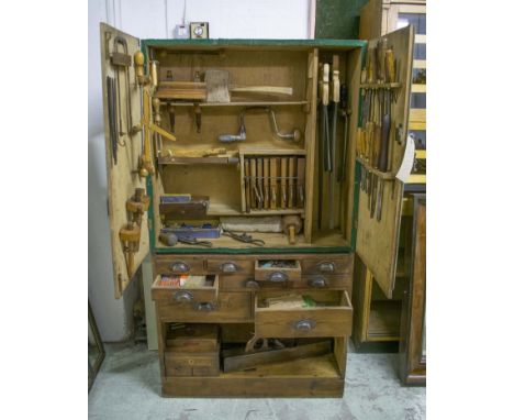 CARPENTERS WORKSHOP CONTENTS, comprising mid 20th century carpenters two door/multidrawer cabinet, 164cm H x 88cm x 27cm with