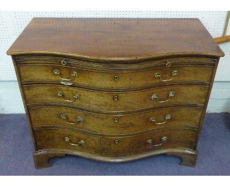 SERPENTINE CHEST, George III mahogany, circa 1770, with a brushing slide over four graduated drawers on bracket supports, 57c