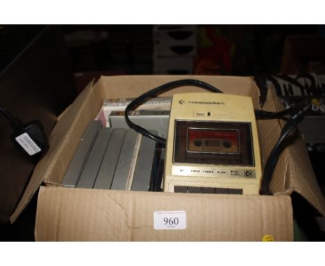 A box containing a Commodore and various games - sold as collector's item