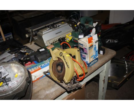 A reciprocating saw; and a Bosch sander; a Black &amp; Decker rip saw; a hydraulic bottle jack; and a Bosch cordless screwdri