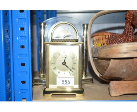 An anniversary clock together with a mantle clock