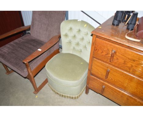 A green velvet upholstered button back nursing chair