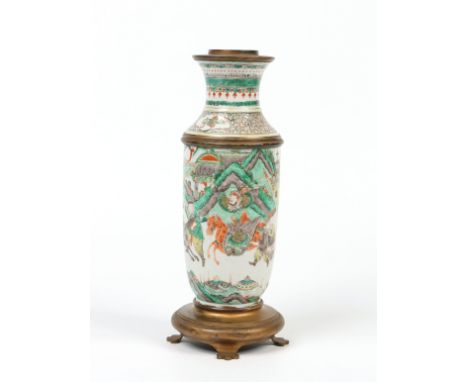 A 19th century Chinese famille vert vase converted to an oil lamp with gilt metal mounts. Decorated in coloured enamels with 