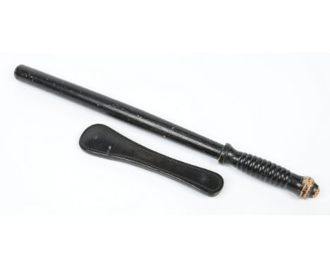 A Smith & Wesson leather persuader with lead weight and a turned hardwood and ebonised night stick again by Smith & Wesson. L